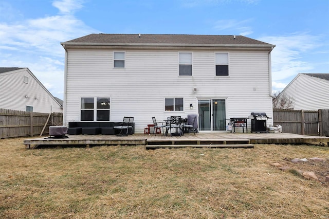 back of property with a yard, an outdoor hangout area, and a deck