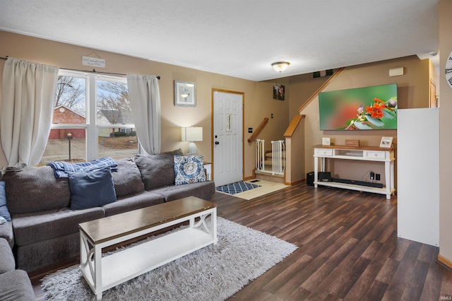 living room with dark hardwood / wood-style floors