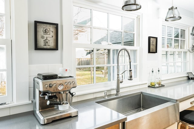 kitchen with sink and hanging light fixtures