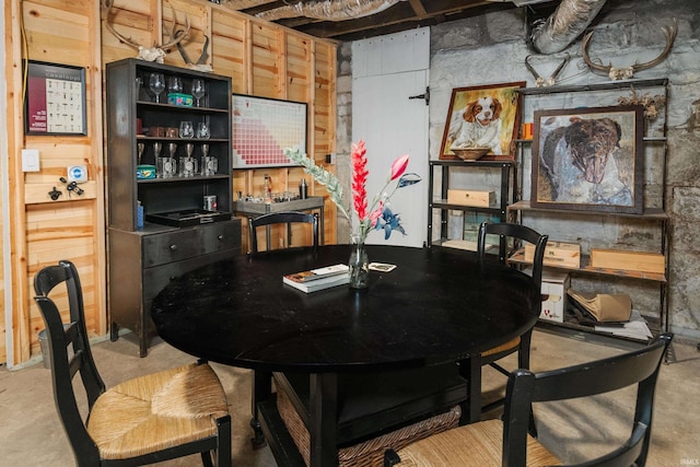 dining area with concrete floors