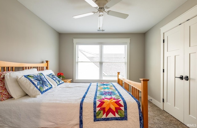 bedroom featuring a closet, ceiling fan, and carpet