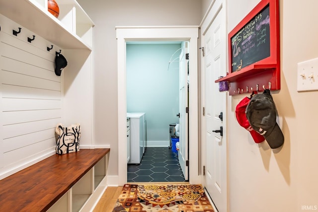 mudroom with washer and dryer