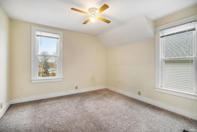 bonus room with ceiling fan, lofted ceiling, and carpet