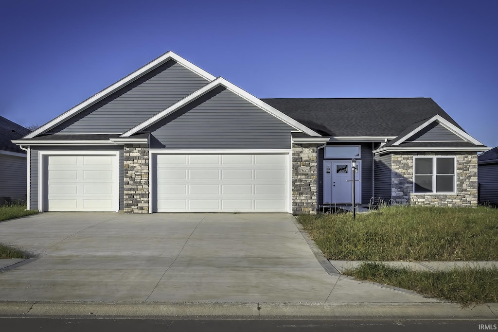 14189 Escondida Cv, Fort Wayne, IN 46845 - view of front facade featuring a garage