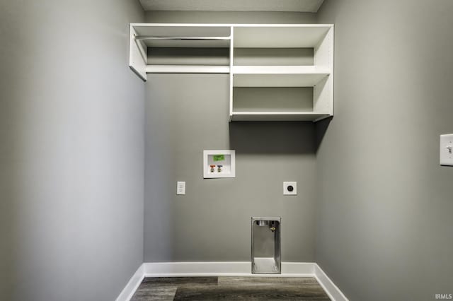 washroom featuring electric dryer hookup, washer hookup, and dark hardwood / wood-style flooring