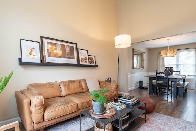 living room featuring dark wood-type flooring