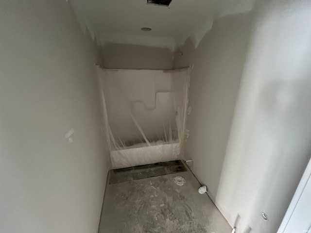 bathroom featuring concrete flooring