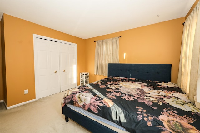 bedroom featuring a closet and carpet