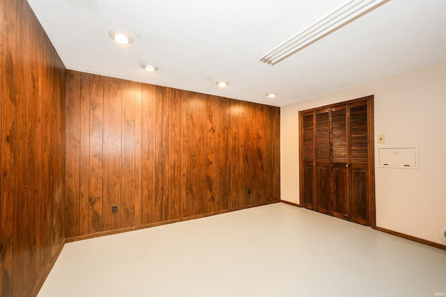 basement with wood walls