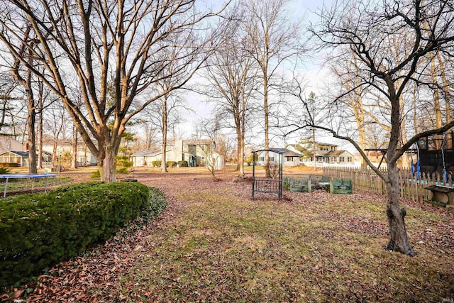 view of yard with a trampoline