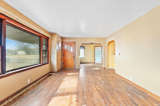 spare room featuring hardwood / wood-style flooring