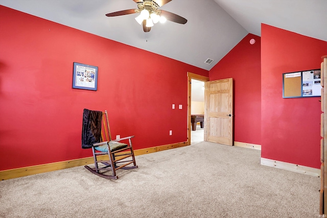 sitting room featuring lofted ceiling, carpet flooring, and ceiling fan