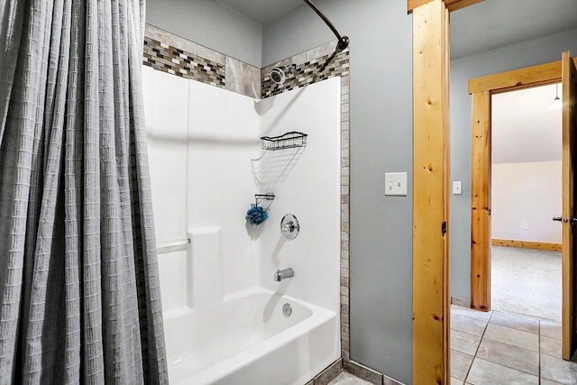 bathroom featuring tile patterned floors and shower / bath combo