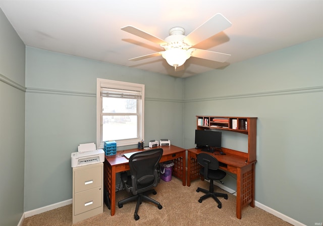 office area with carpet floors and ceiling fan