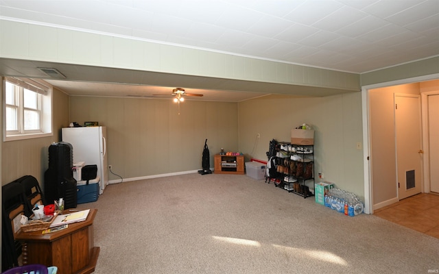 misc room featuring carpet floors and ceiling fan