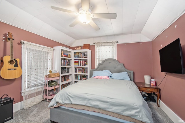 bedroom with lofted ceiling, carpet floors, and ceiling fan