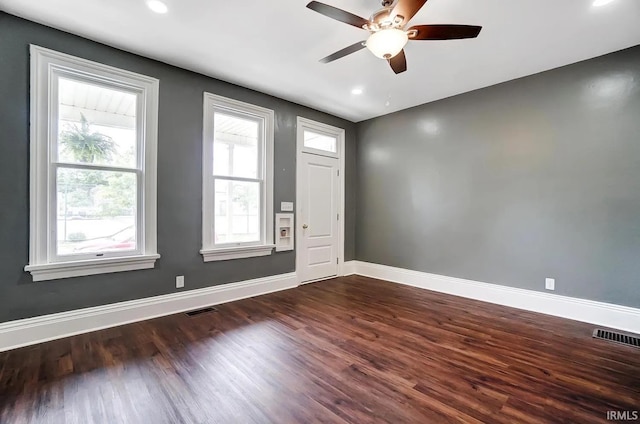 entryway featuring ceiling fan and dark hardwood / wood-style floors