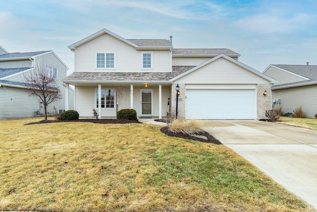 view of front property featuring a garage and a front lawn