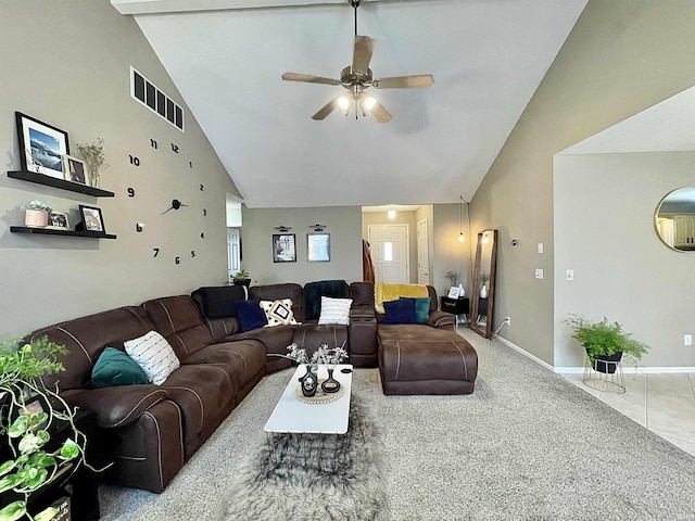 living room with ceiling fan and high vaulted ceiling