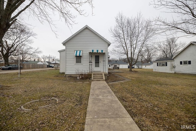 bungalow with a front yard