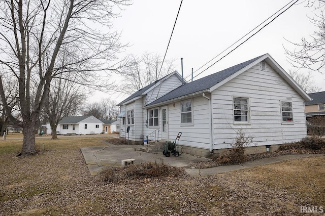 rear view of property with a patio area