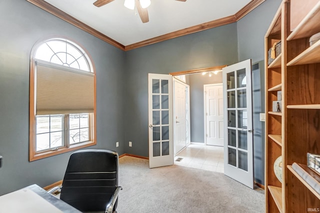 carpeted home office with french doors, ornamental molding, and a wealth of natural light