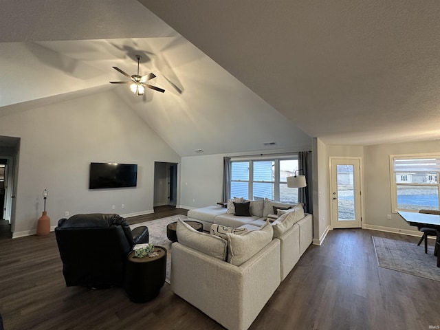 living room with ceiling fan, high vaulted ceiling, and dark hardwood / wood-style flooring