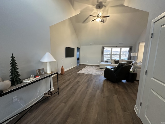 living room with vaulted ceiling, dark hardwood / wood-style floors, and ceiling fan