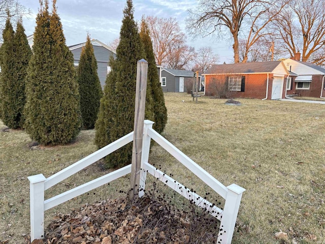 view of yard featuring a garage