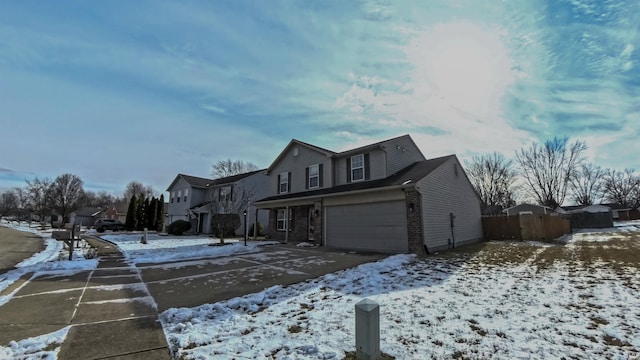 front of property with a garage