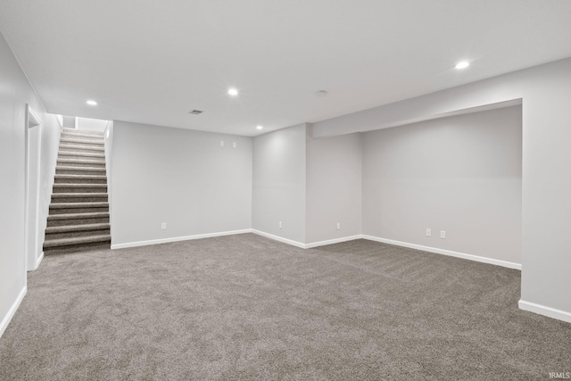 basement with dark carpet