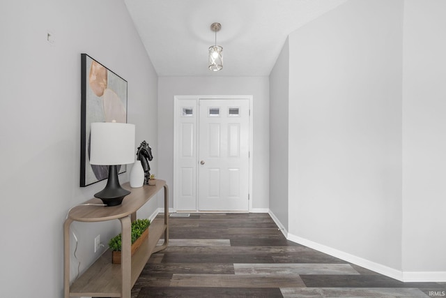 doorway to outside with dark hardwood / wood-style flooring