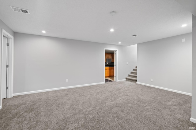 basement featuring carpet flooring