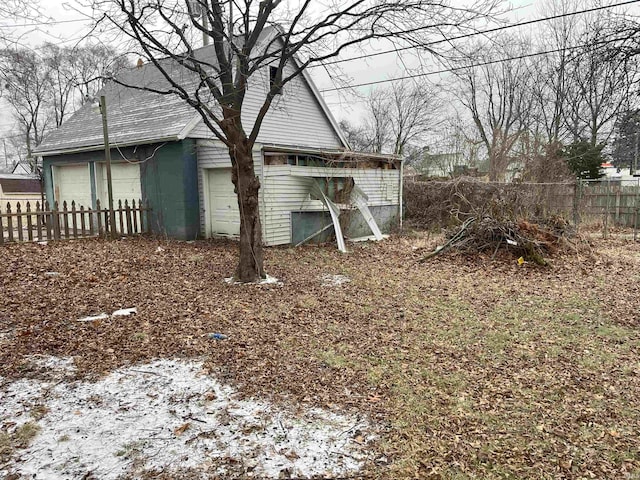 view of property exterior with a garage