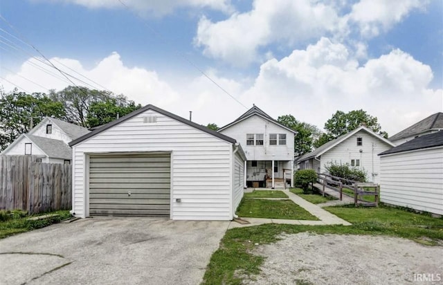 view of front of house with an outbuilding and a garage