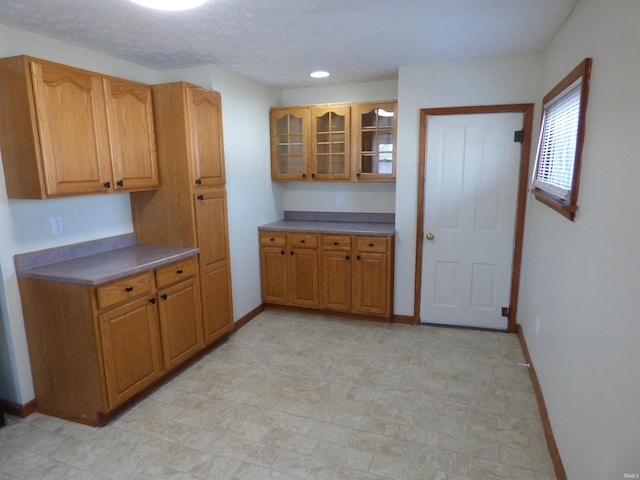 kitchen featuring a textured ceiling