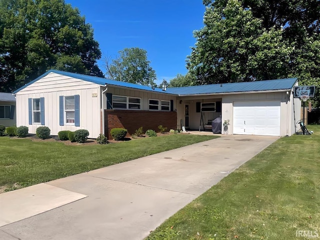 ranch-style house featuring a garage and a front yard