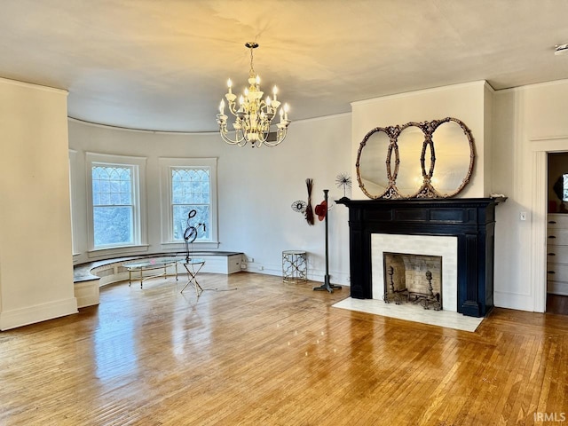 interior space featuring an inviting chandelier and hardwood / wood-style floors