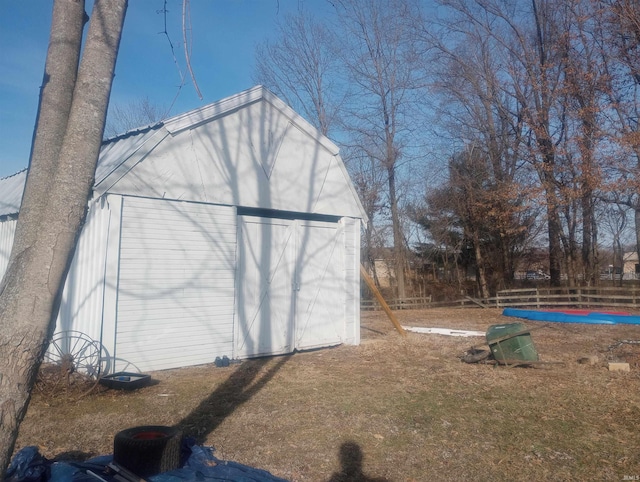 view of outbuilding featuring a garage