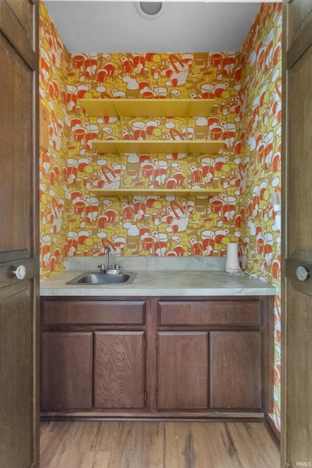 bathroom with vanity and hardwood / wood-style floors