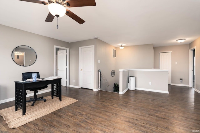 office space with dark hardwood / wood-style flooring and ceiling fan