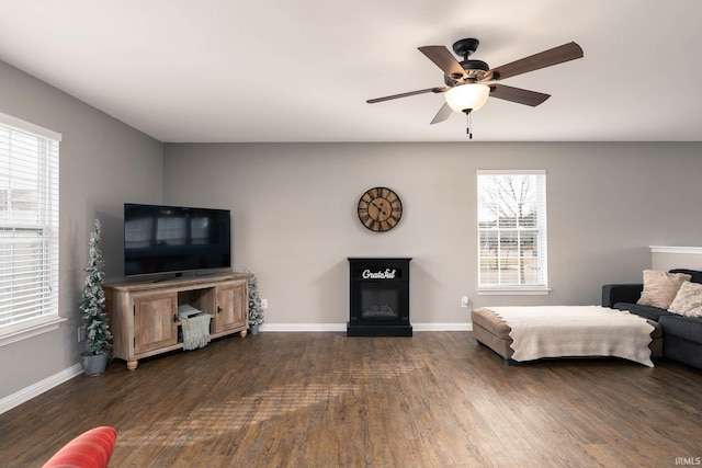 bedroom featuring dark wood-type flooring and ceiling fan