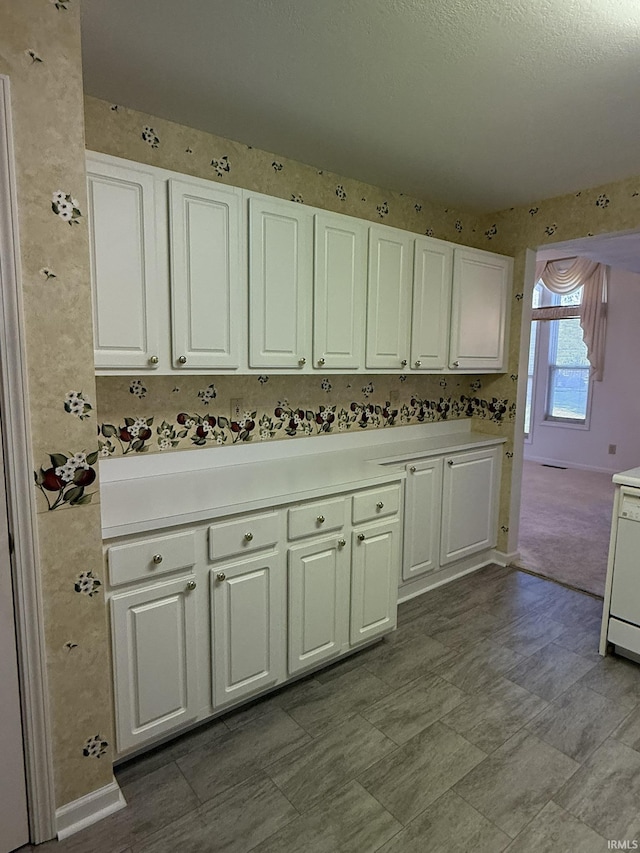 kitchen with white cabinetry