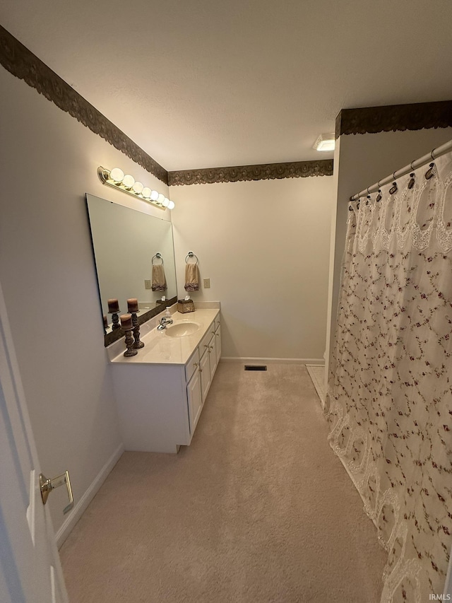 bathroom featuring vanity and walk in shower