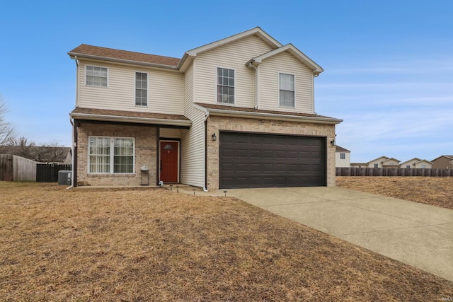 view of front property with a garage and cooling unit