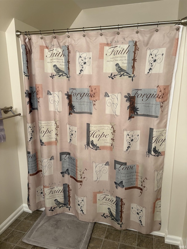 bathroom featuring tile patterned floors and walk in shower