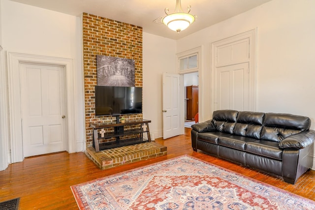 living room with hardwood / wood-style flooring