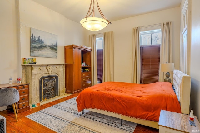 bedroom with wood-type flooring