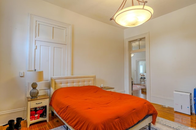 bedroom featuring hardwood / wood-style flooring