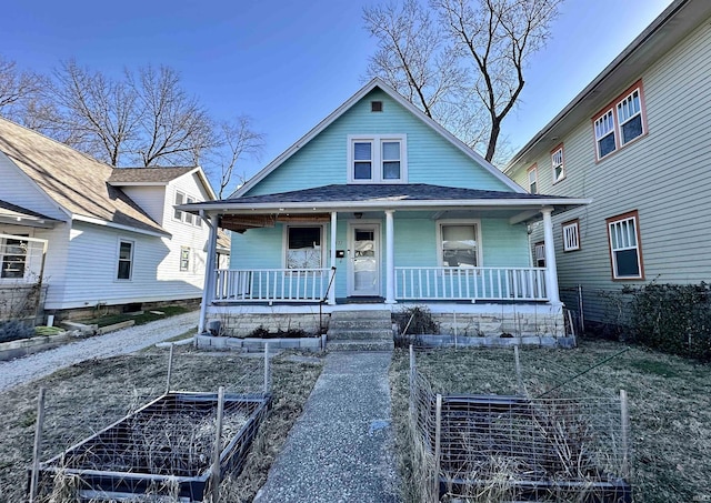 bungalow-style home with a porch